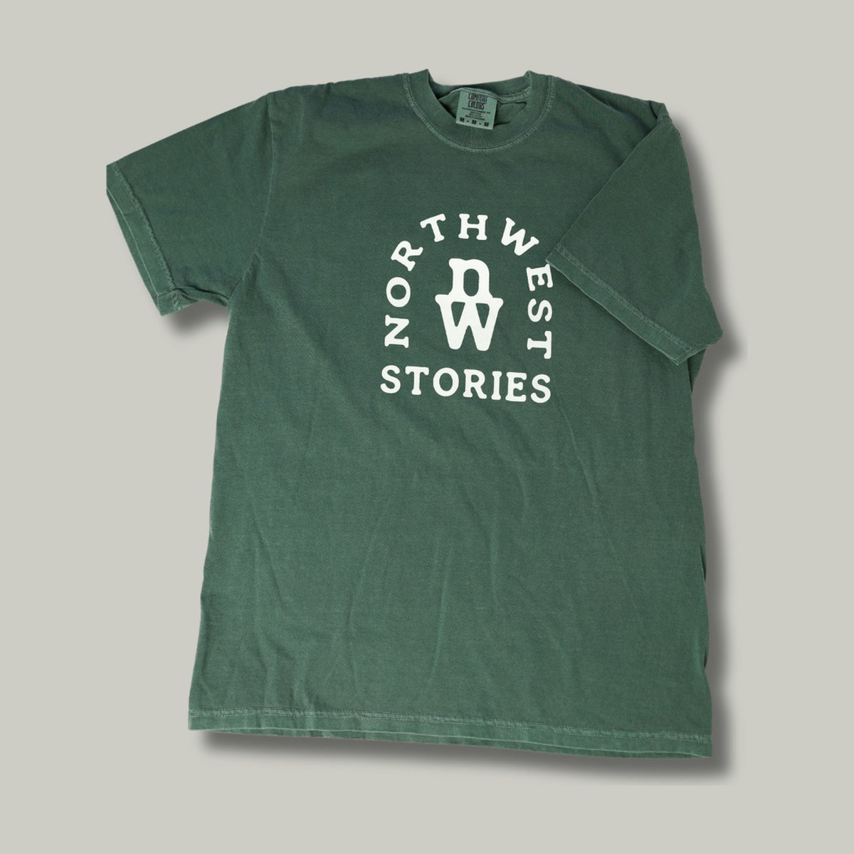 Green Northwest Stories logo T-shirt, front